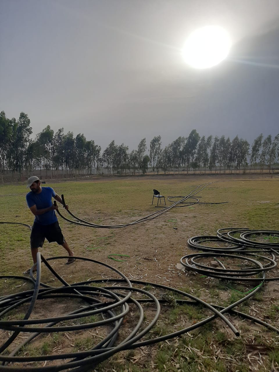 Team preparing HDPE geothermal pipe loops