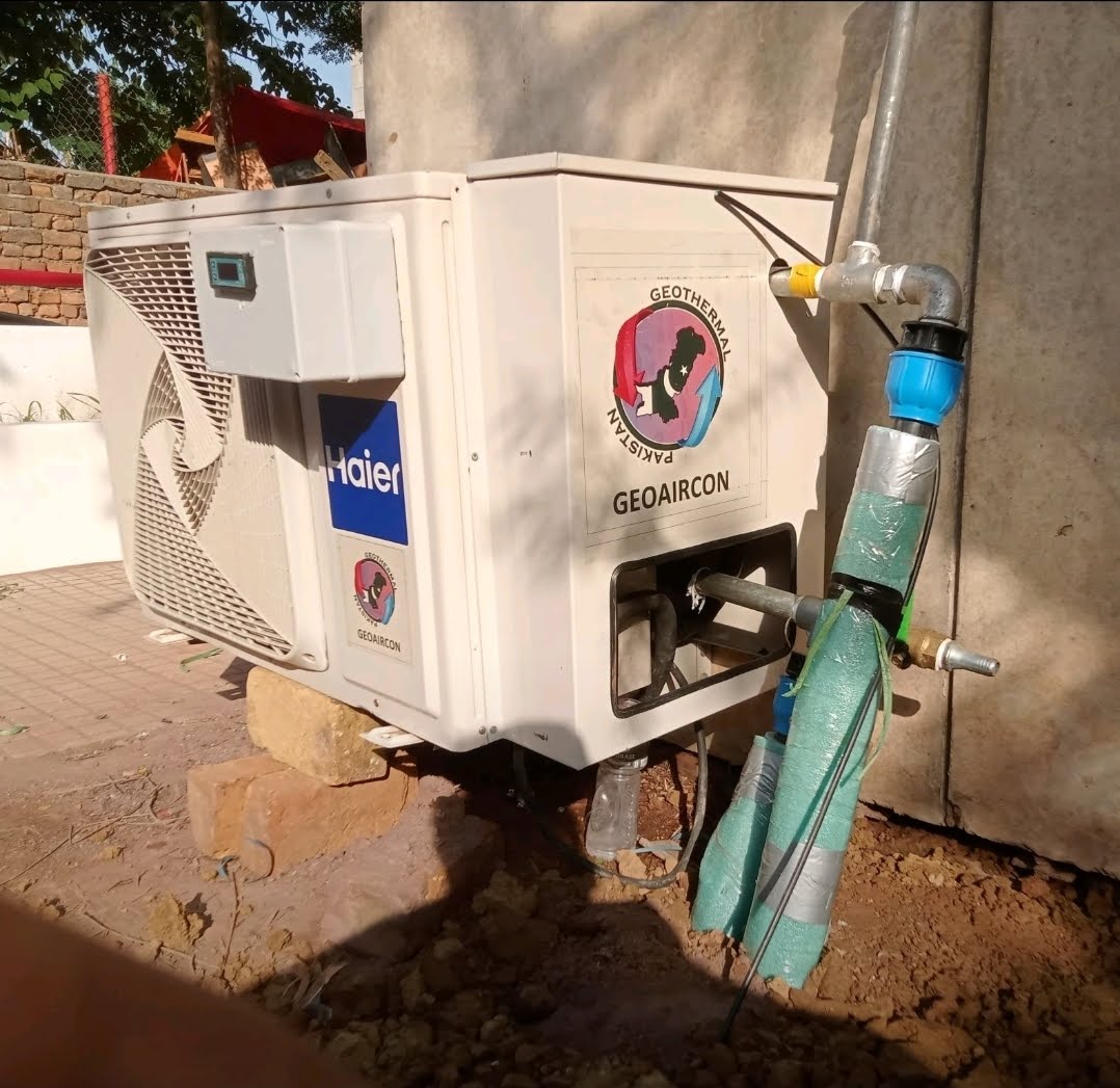 Split air conditioner connected to GeoAirCon hydronic lines